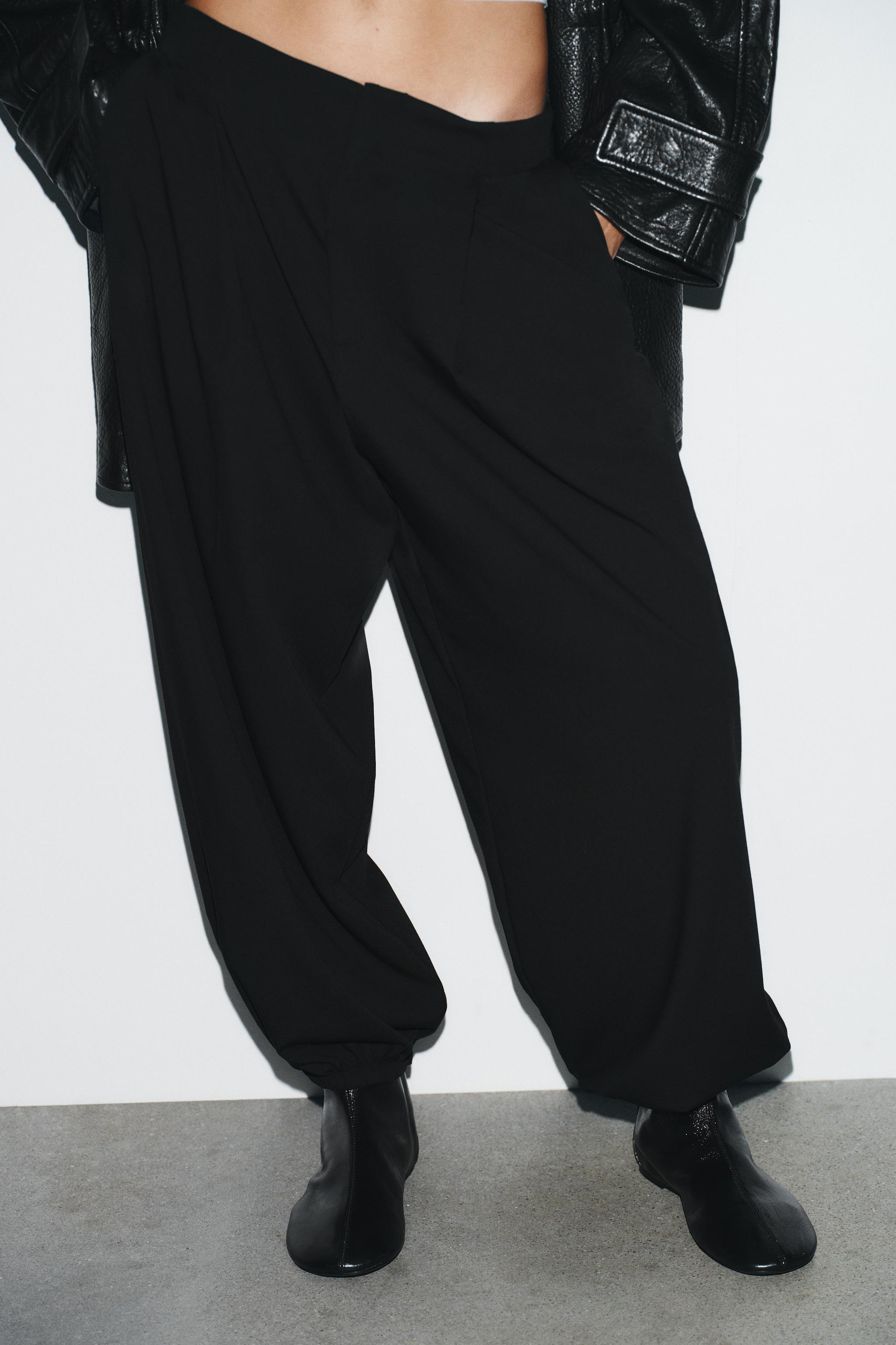 PINSTRIPE PLEATED JOGGER PANTS